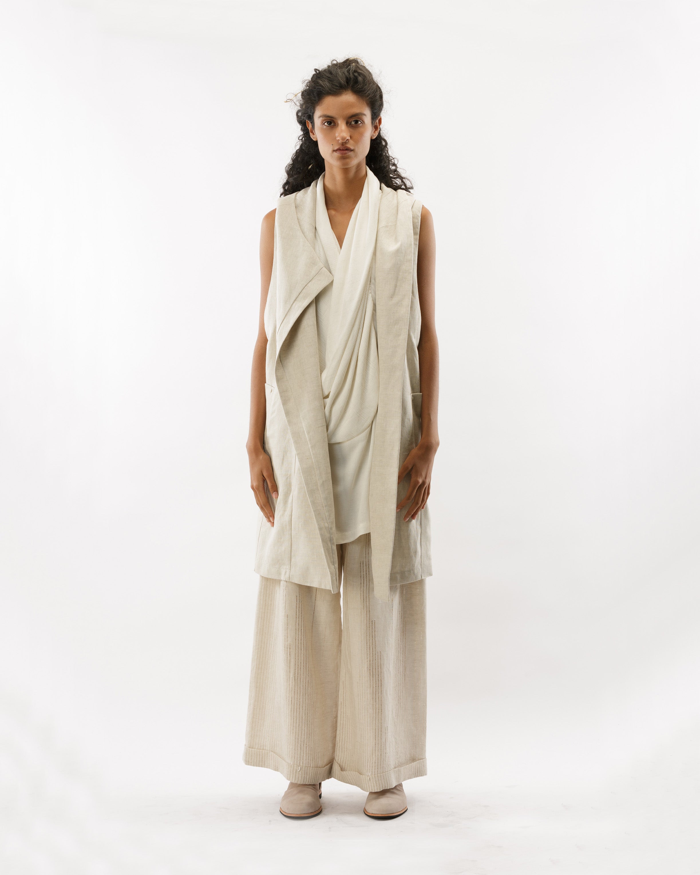 ASYMMETRICAL VEST WITH HOOD