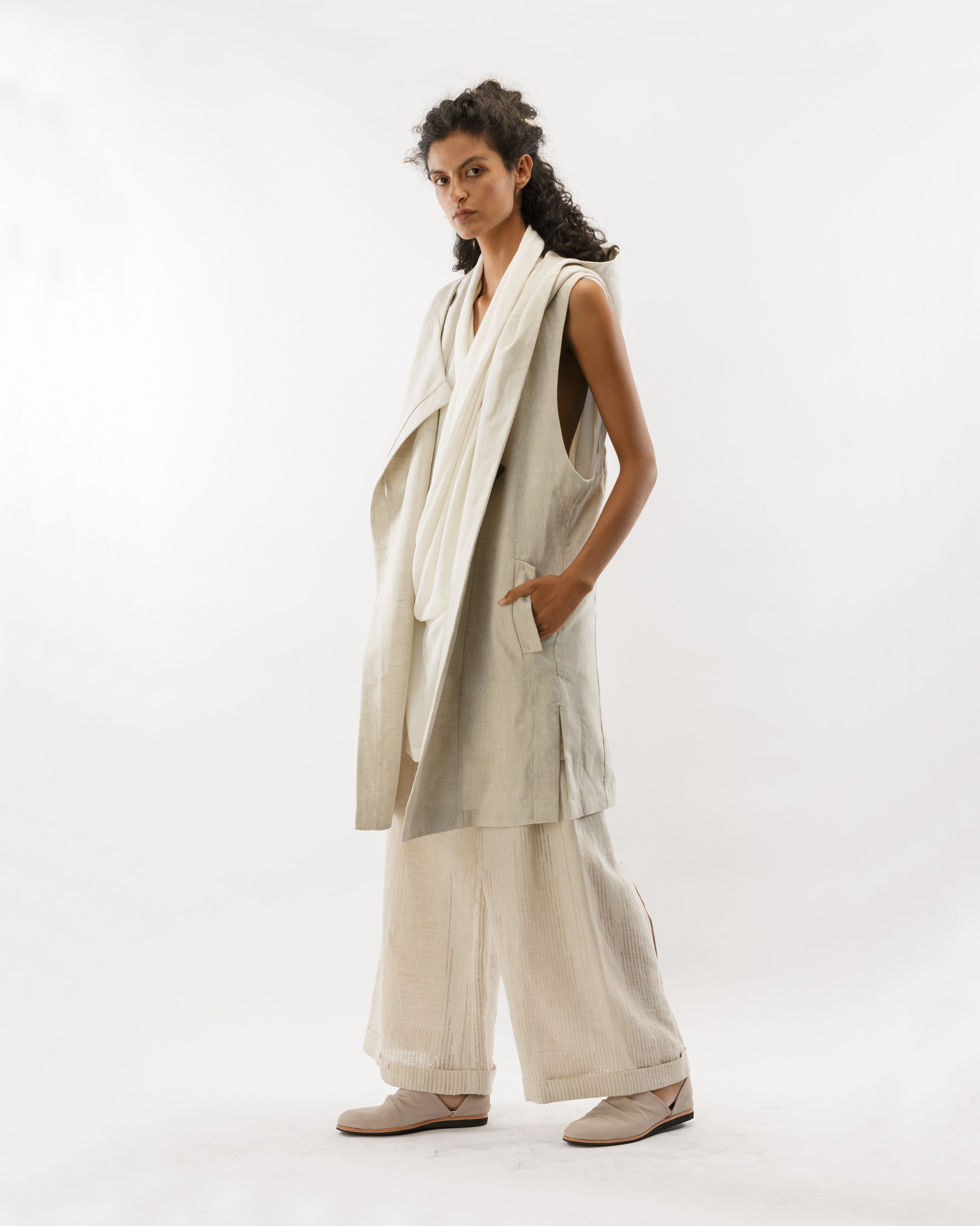 ASYMMETRICAL VEST WITH HOOD