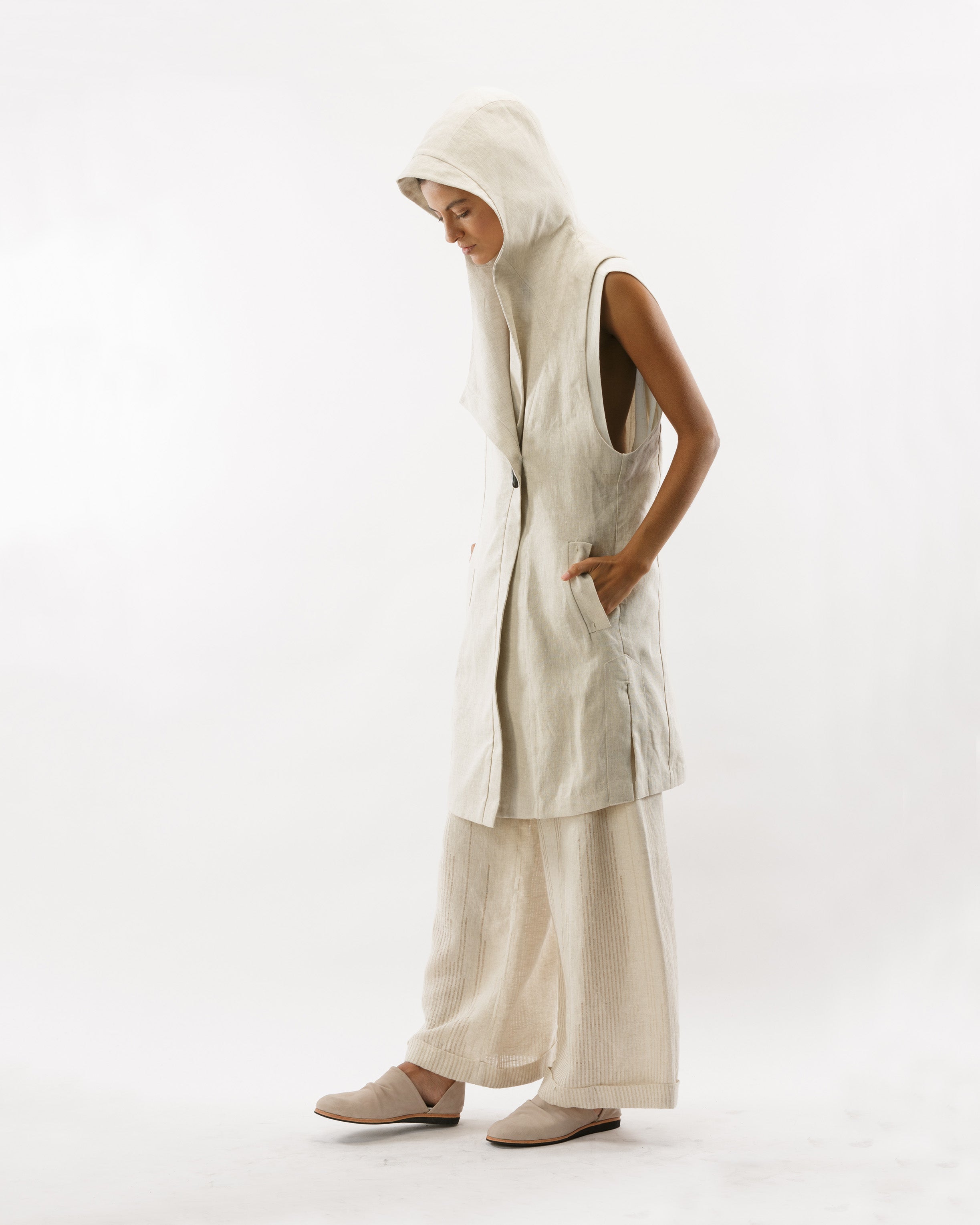 ASYMMETRICAL VEST WITH HOOD