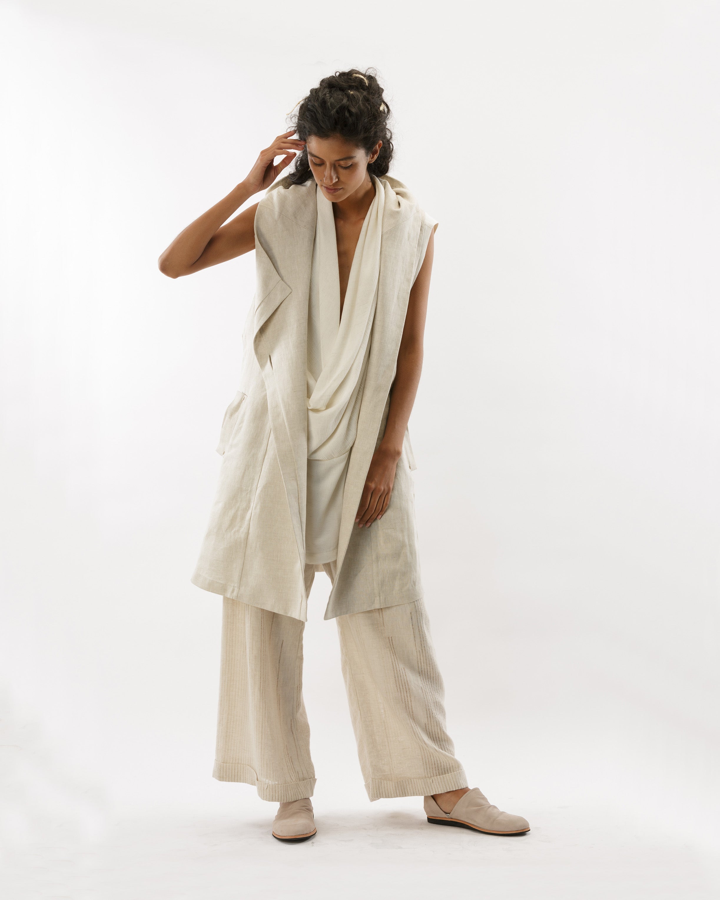 ASYMMETRICAL VEST WITH HOOD